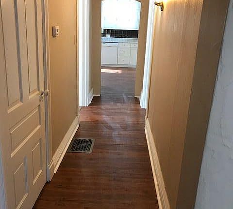 Hallway from front living room to kitchen and bedroom