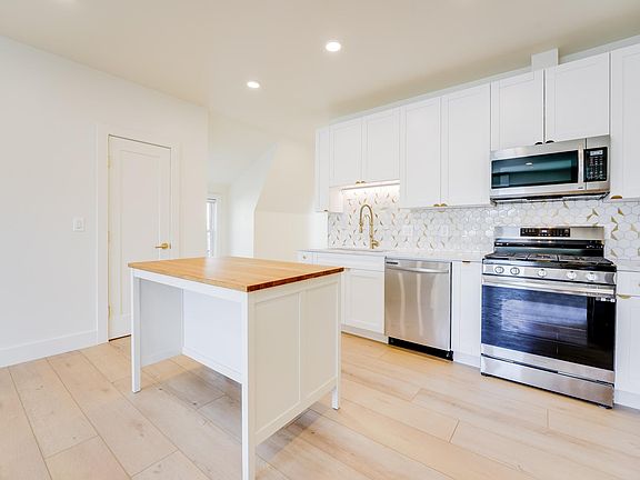Kitchen with brand new Samsung appliances
