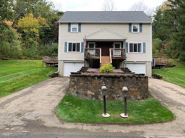 Front of house. Right side unit.