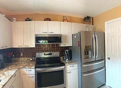 Kitchen with granite and all new appliances.