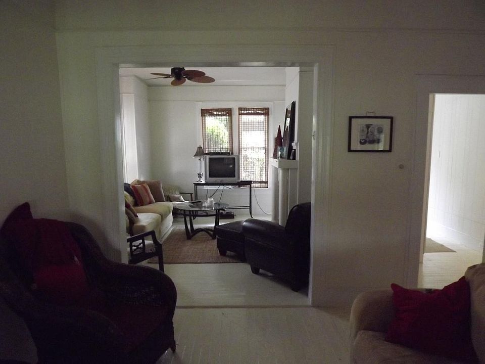 2 living rooms leading to kitchen