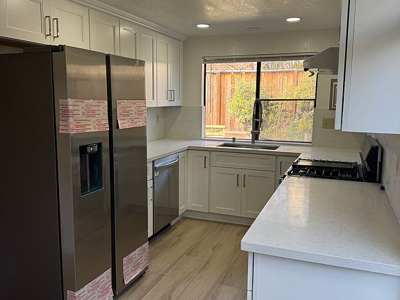 Kitchen with New Refrigerator installed in Jan 2026