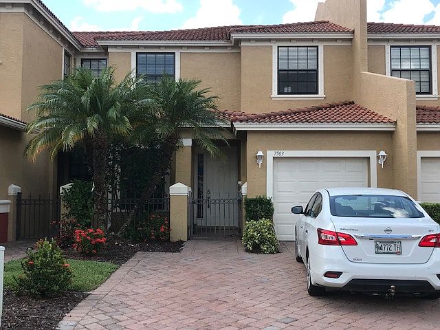 Front of house. Garage with additional off road parking