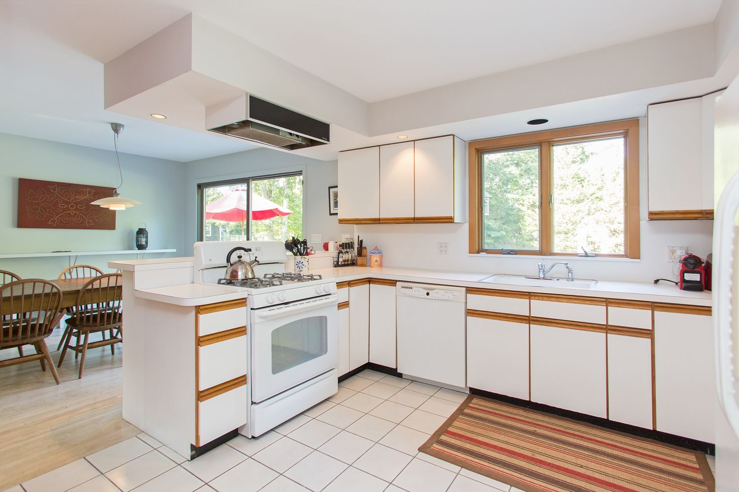 KITCHEN LOOKS OUT TO POOL