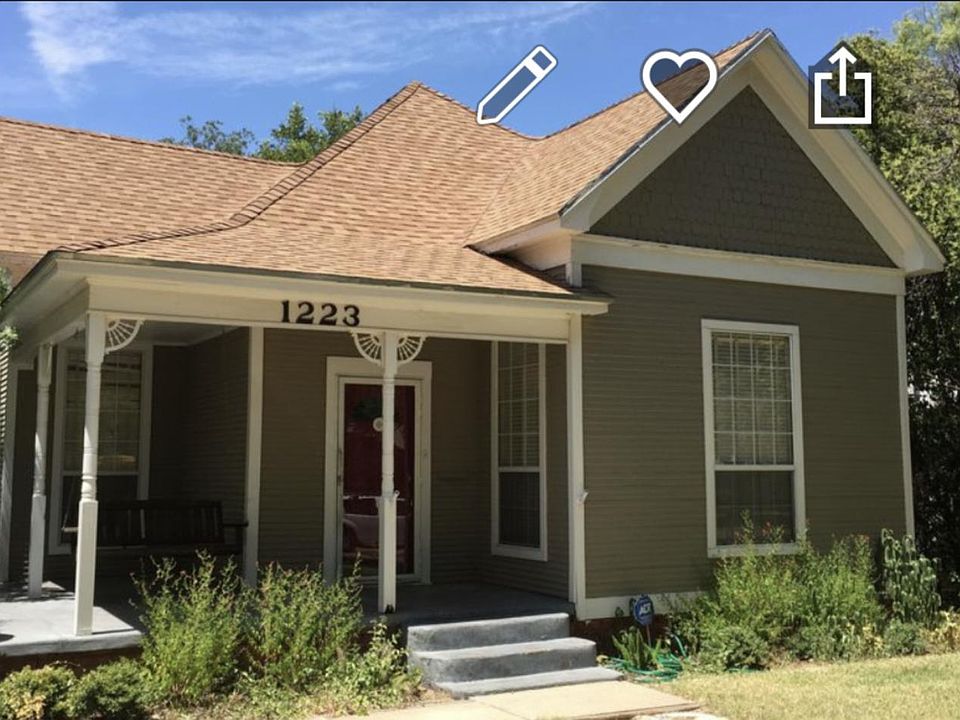 House front with porch.