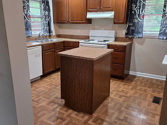 Back deck (12'x15')off the kitchen. Refrigerator, dishwasher and stove provided.