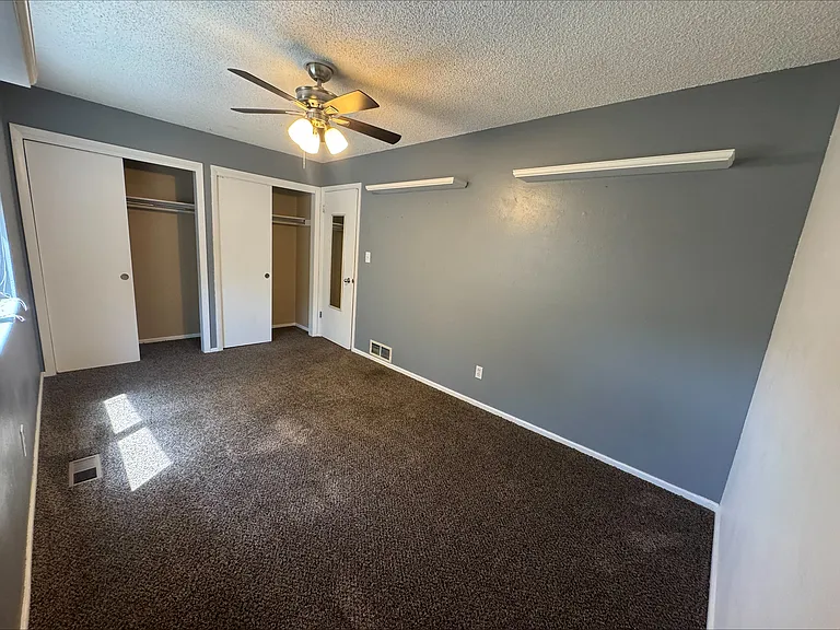 Upstairs 2nd bedroom with double closets