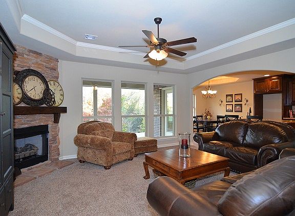 Family room looks onto greenbelt