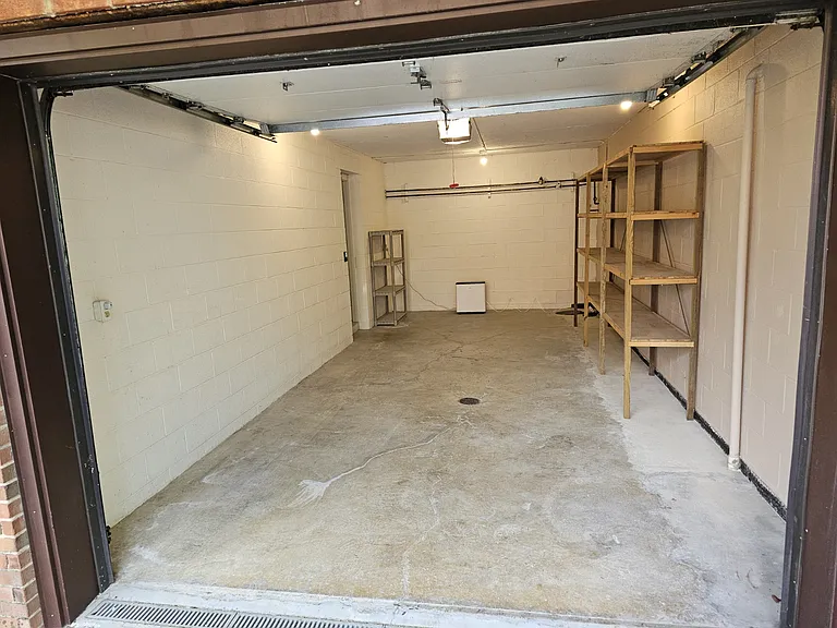 Exterior view of the elongated single car garage.