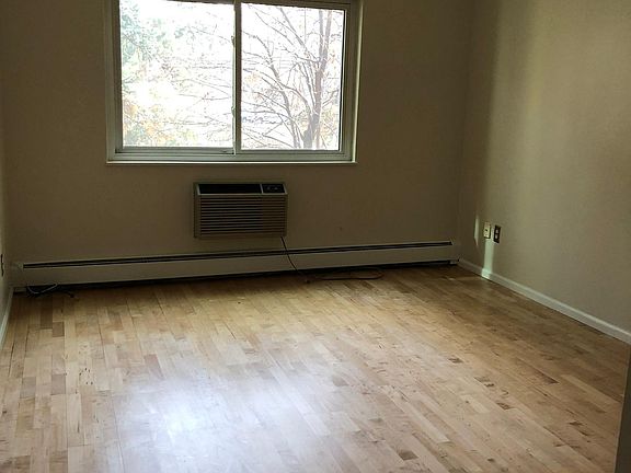 Spacious bedroom with a/c unit!