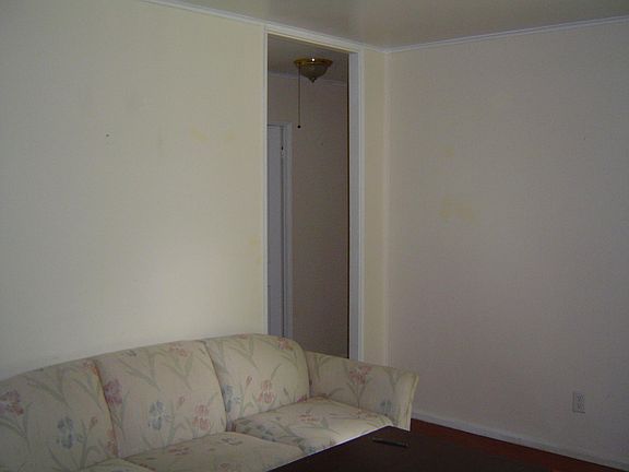 Living room lookin north, front door out of picture to right