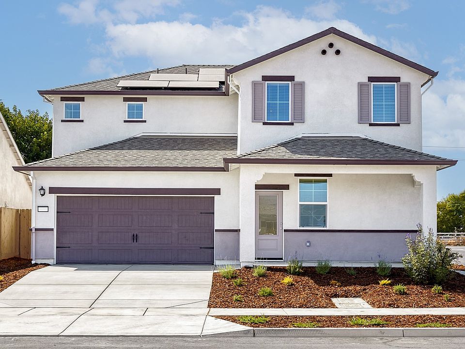 The Stinson is a two story home with stucco.