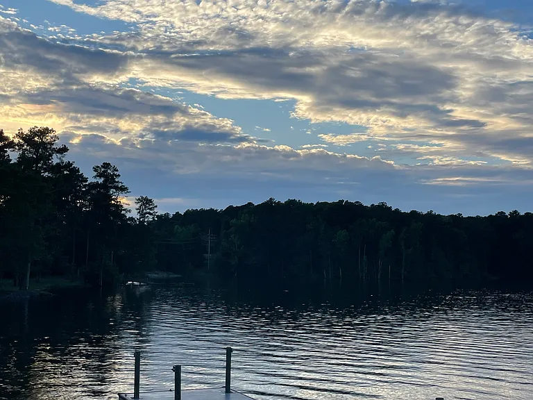 Lake living just a short walk away, area has dedicated golf cart parking as well.