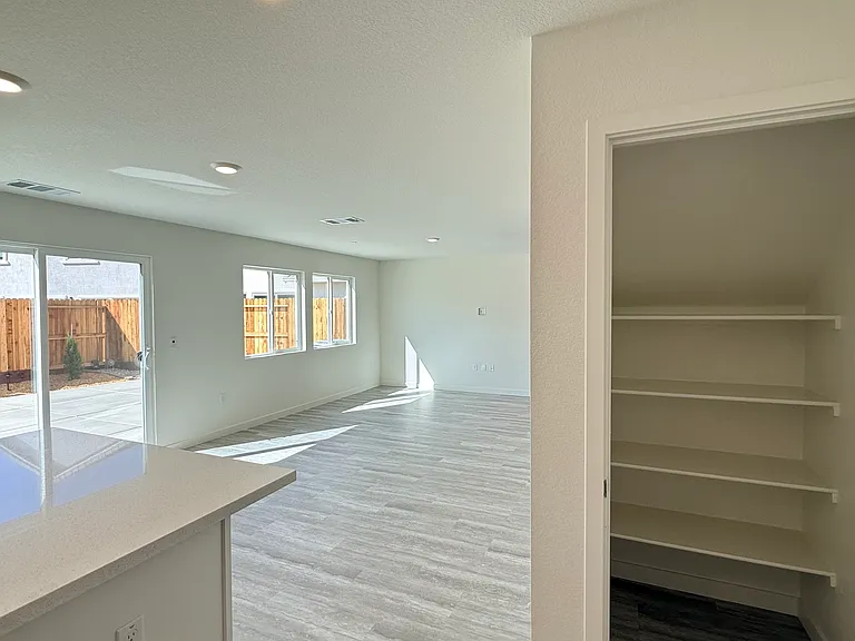 Spacious kitchen pantry for easy, organized storage of groceries and everyday essentials