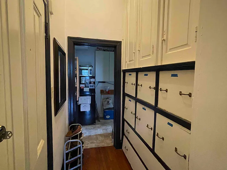 Hallway and floor-to-ceiling built-ins