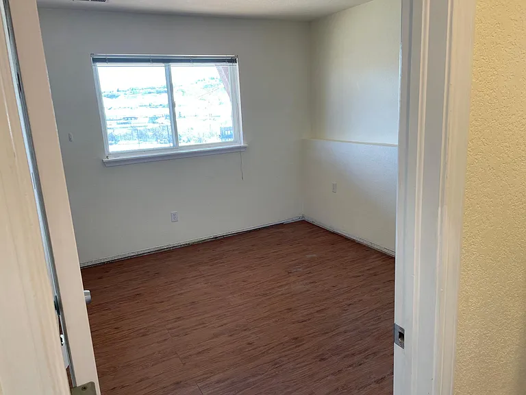 Lower floor bedroom 2 (new trim has since been installed)