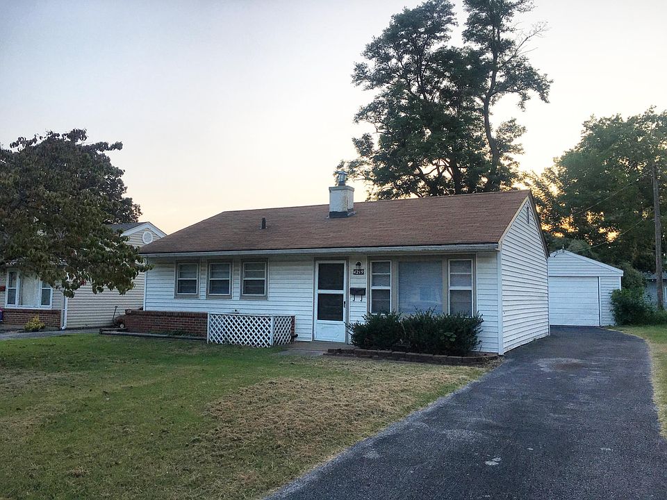 Front of House with long off street driveway