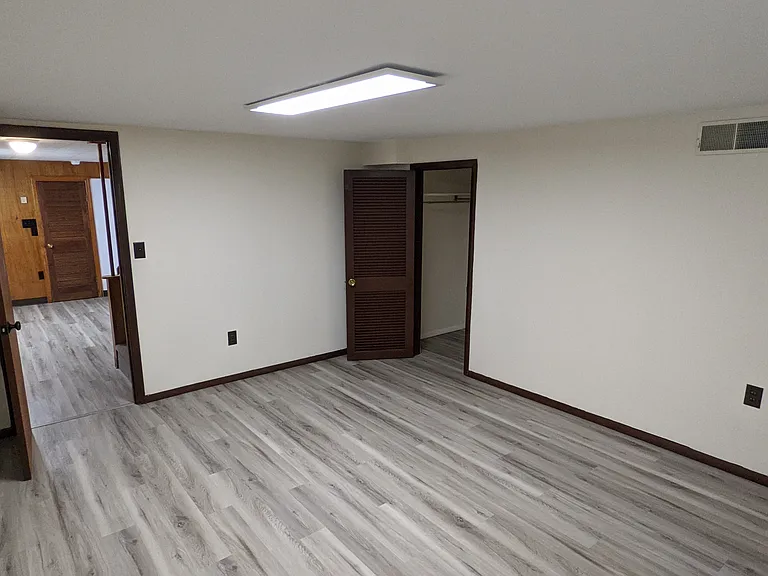 Third bedroom located in the basement. Entry view.