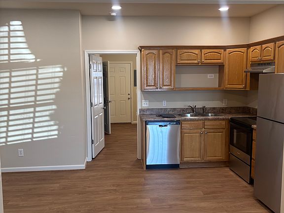Kitchen with eating area to left.