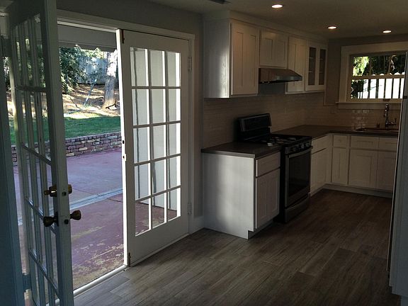 French door leads out to patio and front yard
