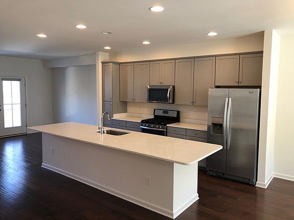 Upgraded kitchen with beautiful hardwood floors