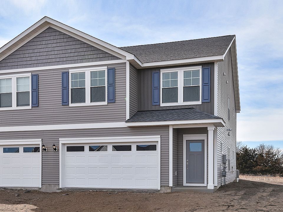 The Mayfield is a beautiful two story home with siding.