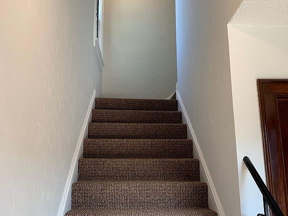 Stairs leading to second floor unit