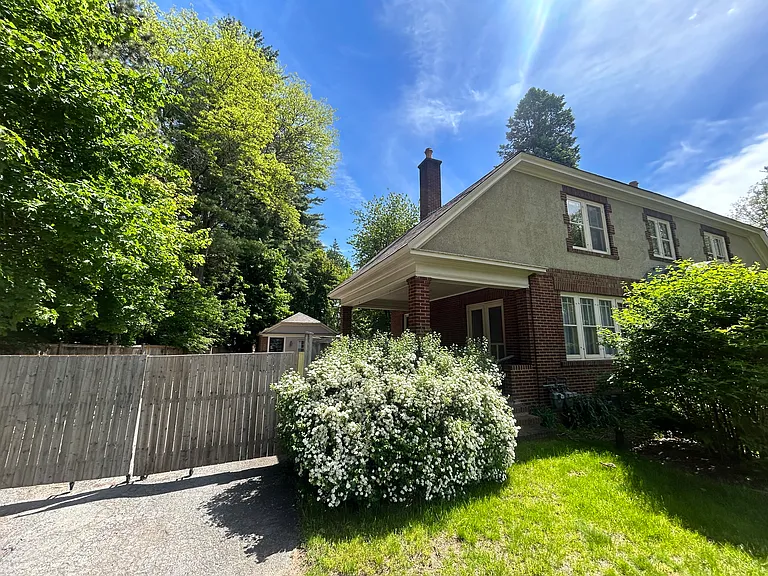 Fully fenced-in yard with gate.