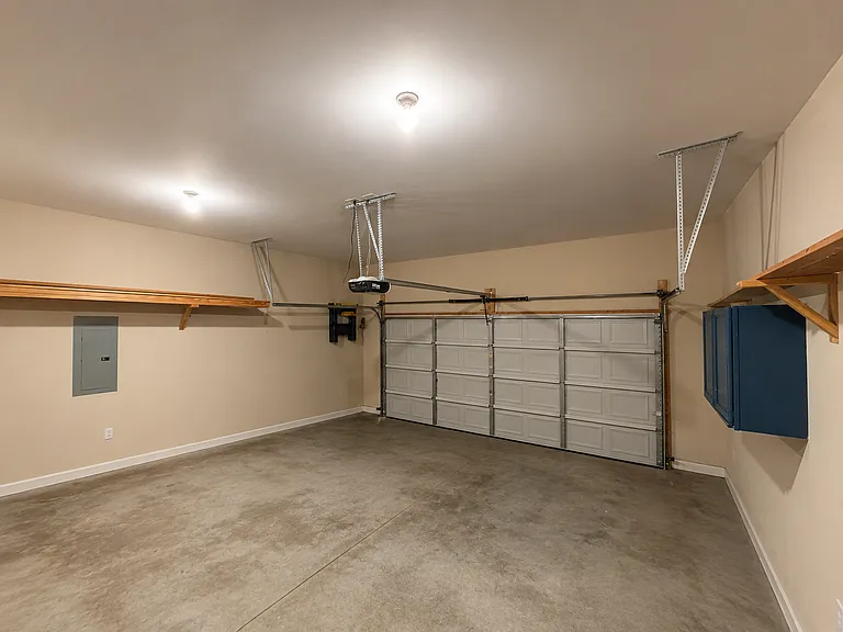 Two car garage w/ second fridge