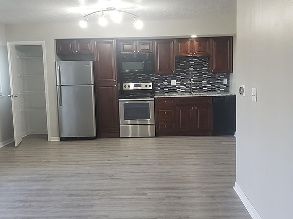 City View One bedroom Layout- Kitchen and Family room, view from Family room.