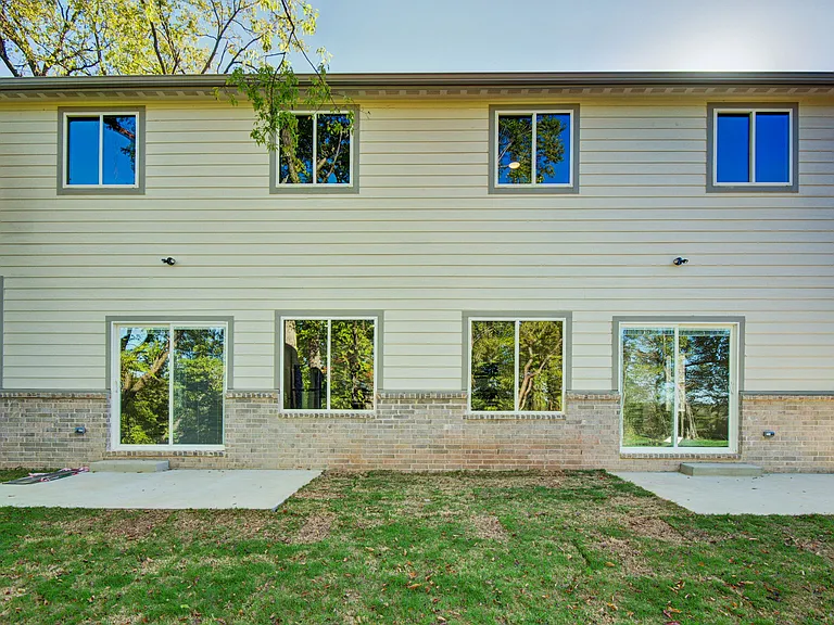 Backyard. It is currently fenced in separately for both units. (Not shown)
