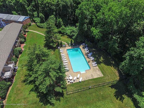 Complex pool is tucked away in a private location.