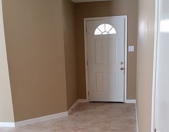Beautifully tiled entry is warm and inviting