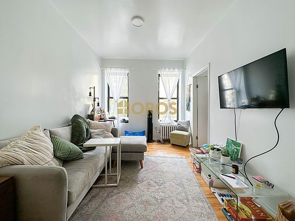 3rd image of 238 E 7th St APT 6