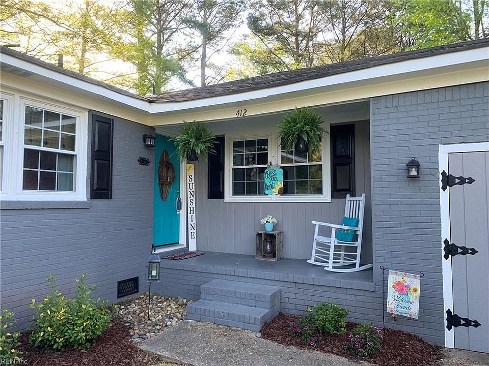Adorable front porch is perfect for early morning coffee or afternoon libations!  