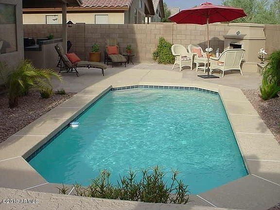 backyard pool and fireplace