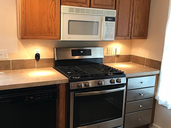 New stainless steel drawer fronts and range