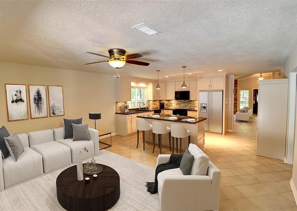 Location, location, location!  This spacious UPDATED one story is located minutes from The Woodlands Mall and Market Street shopping.  Golf course nearby.  Never flooded.