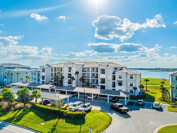 Aerial view on the condo and behind is the golf course and lake view