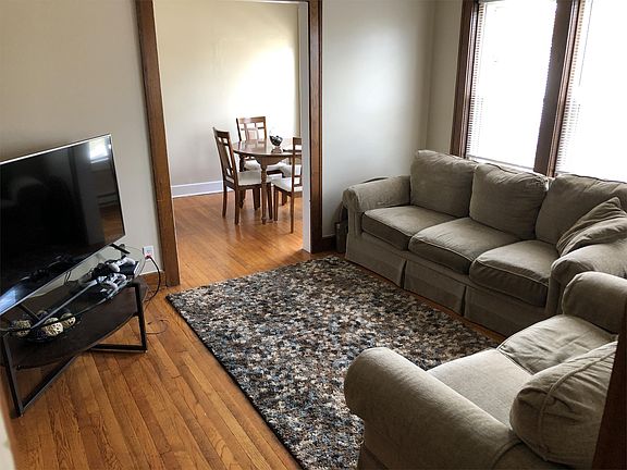 living room, facing dining room