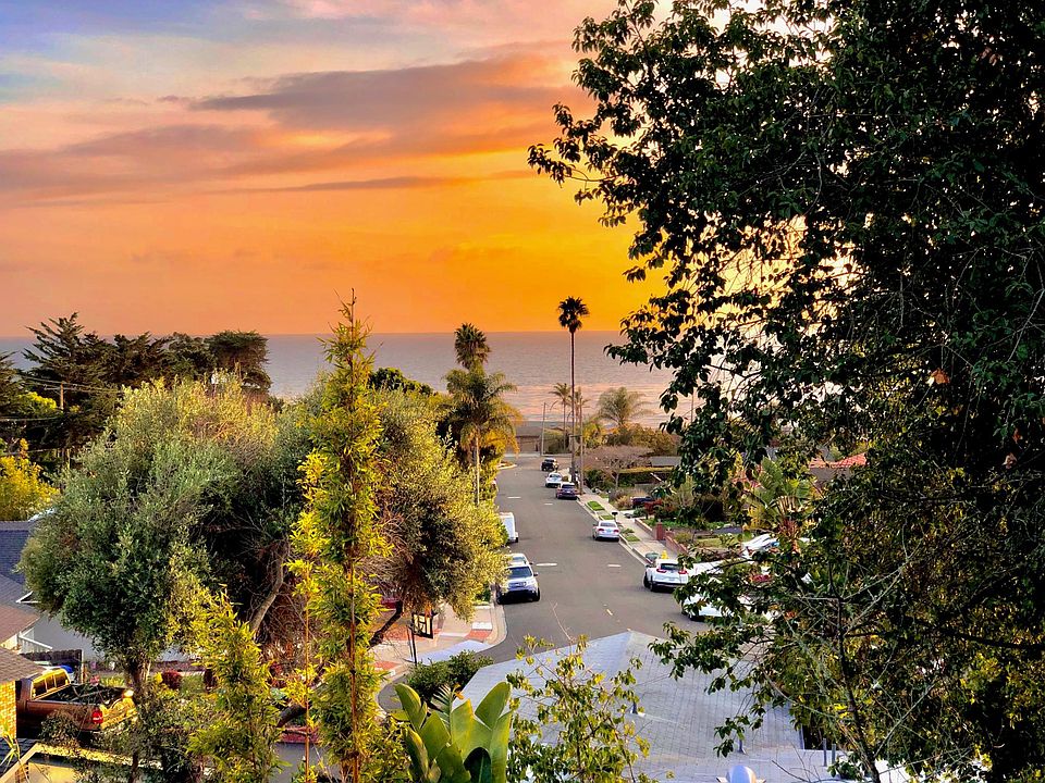 View from back of lot, over garage of 107 Naomi Ave, The beach stairs are at the end of this street of over a million and multi-million dollar homes.