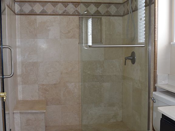 Custom Travertine master bath shower