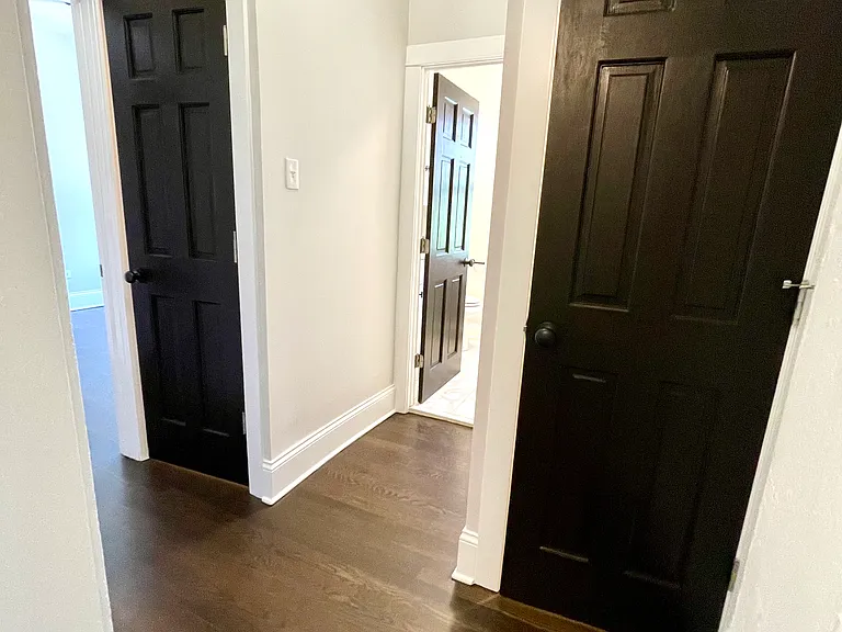 primary bedroom / bathroom hallway + closets