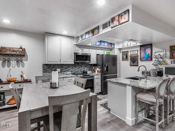 5th image of 8535 E BELLEVIEW Street