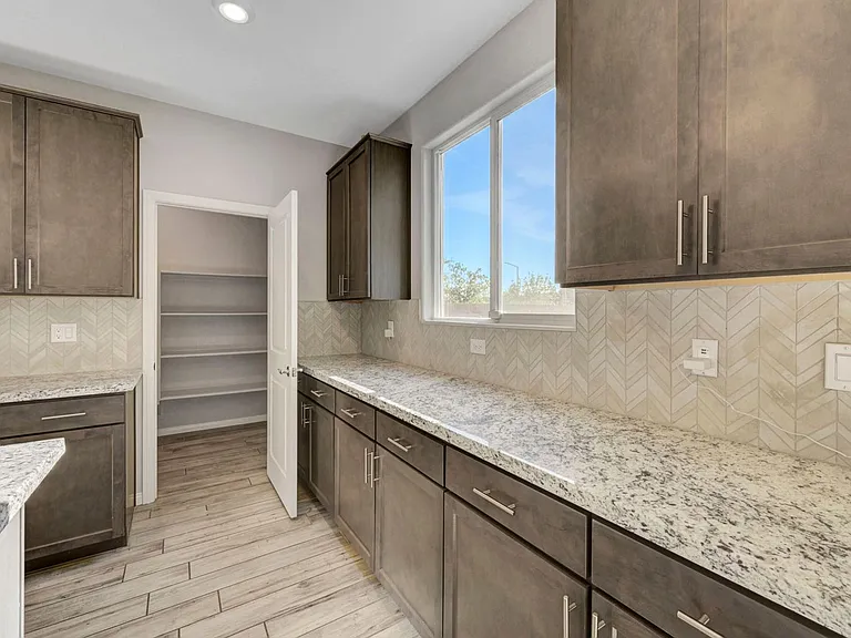 7447 Ardenno St — Photo 12