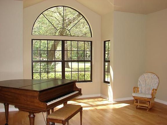 Entertain guests in the light and bright living room.