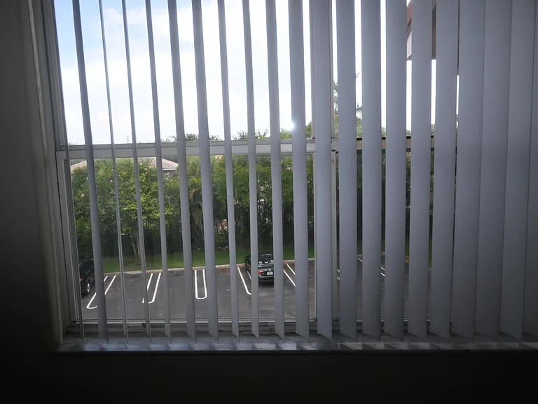 8721 Wiles Rd #305 — Photo 32