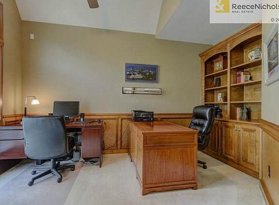 Vaulted ceilings and built-ins grace the main floor office.