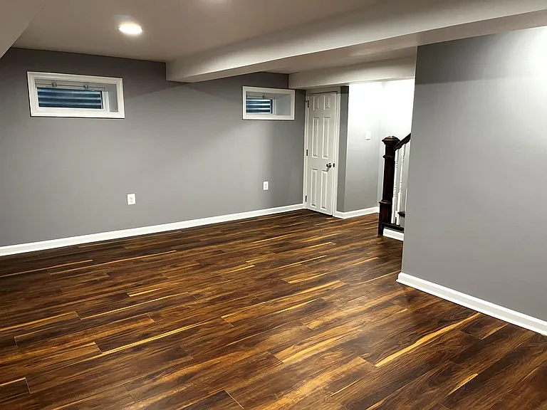 Lower level renovation with fresh paint and luxury vinyl flooring. Laundry room is also on lower level