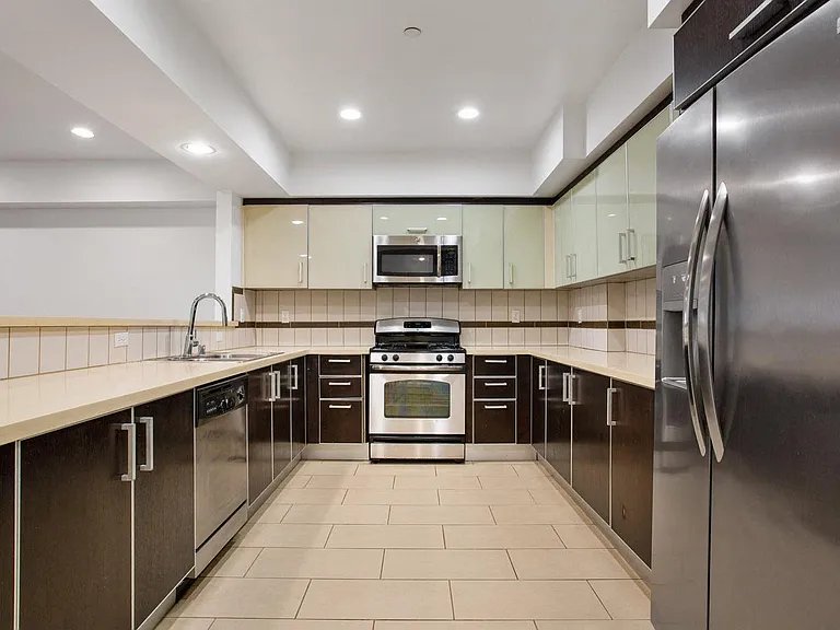 Large-Size Kitchen with Energy-Efficient Appliances with Ample Cabinet Storage